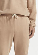 Plant-dyed sweatpants made from organic cotton with kapok