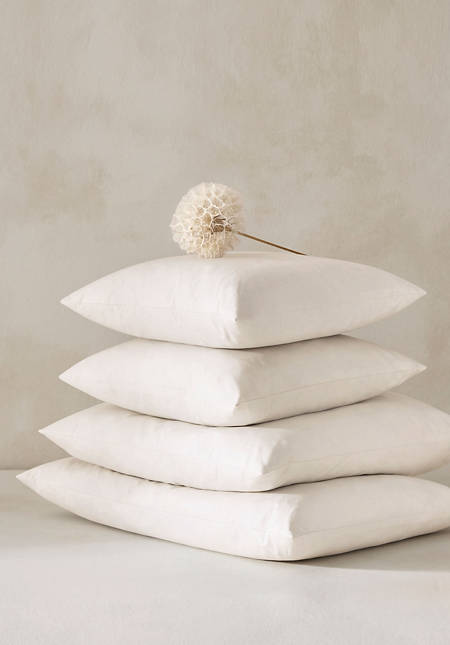 Decorative pillows with fair feathers