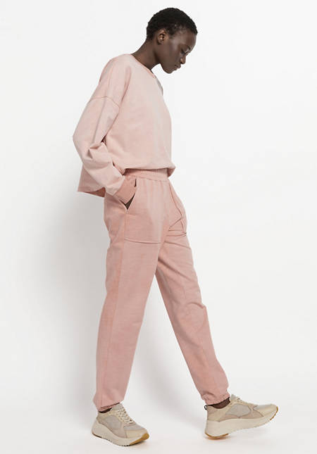 Plant-dyed jogging pants made from organic cotton with kapok